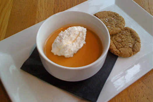 Butterscotch pudding is poured into ramekins