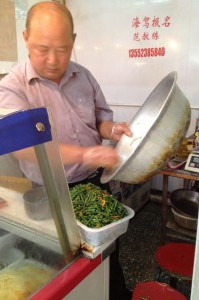Fan Jin preparing a liangcai in Beijing. Credit: Manuela Zoninsein