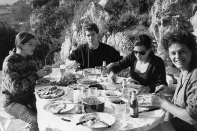 Elisabeth Luard and her children enjoying a Christmas lunch in the sunshine of Vaison-la-Romaine circa 1985.