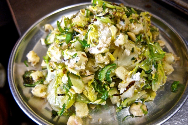 A featured dish at Susan Feniger's Street restaurant: Brussels sprouts with goat cheese, apples and hazelnuts. Credit: David Latt