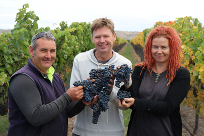 From left, Darren Chatterton, vineyard manager; Paul Ham, managing director; and Kate Galloway, winemaker. Credit: Courtesy of Alpha Domus