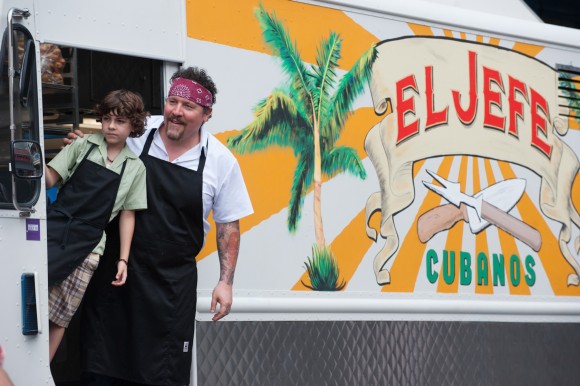 A scene from "Chef" with Emjay Anthony, left, and Jon Favreau. Credit: Open Road Films
