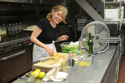 Zester Daily contributor Kathy Hunt preparing for a cooking class. Credit: Sean Dippold