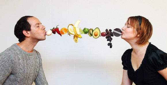 Kissing couple with food Kissing couple with food