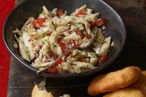 Trini-Style Salt Fish and "Bake."© 2014 by Ellen Silverman from "Caribbean Potluck," permission by Kyle Books