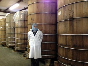 Miso master Joe Kato with the fermentation barrels at Great Eastern Sun.  