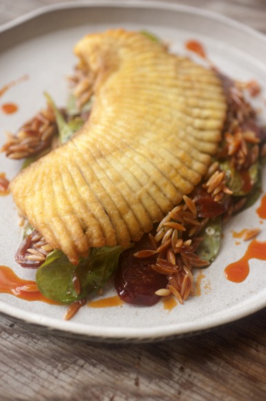 Spiced Skate Wing With Toasted Orzo with Spinach and Chorizo. Credit: Michael Harlan Turkell