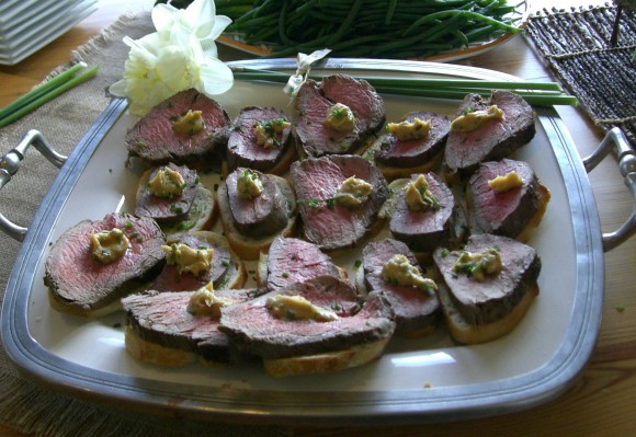 Dress up your New Year's feast with Beef Tenderloin en Croute With Mustard Sauce. Credit: Carole Murko