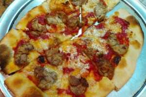 Pizza with sweetbreads and comte cheese or “pizza with blood and thyroid.” Credit: Clifford A. Wright