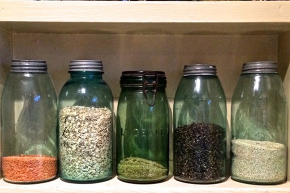 Blue-glass Ball jars lined up on a kitchen shelf. Credit: Deborah Madison Blue-glass Ball jars lined up on a kitchen shelf. Credit: Deborah Madison