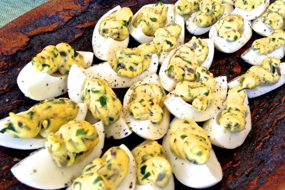 Quarter-sized deviled eggs made with Italian parsley, anchovies and capers. Credit: Copyright 2015 David Latt