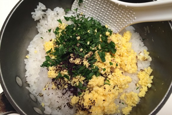 Tossing the ingredients for maze-gohan. Credit: Copyright 2015 Hiroko Shimbo