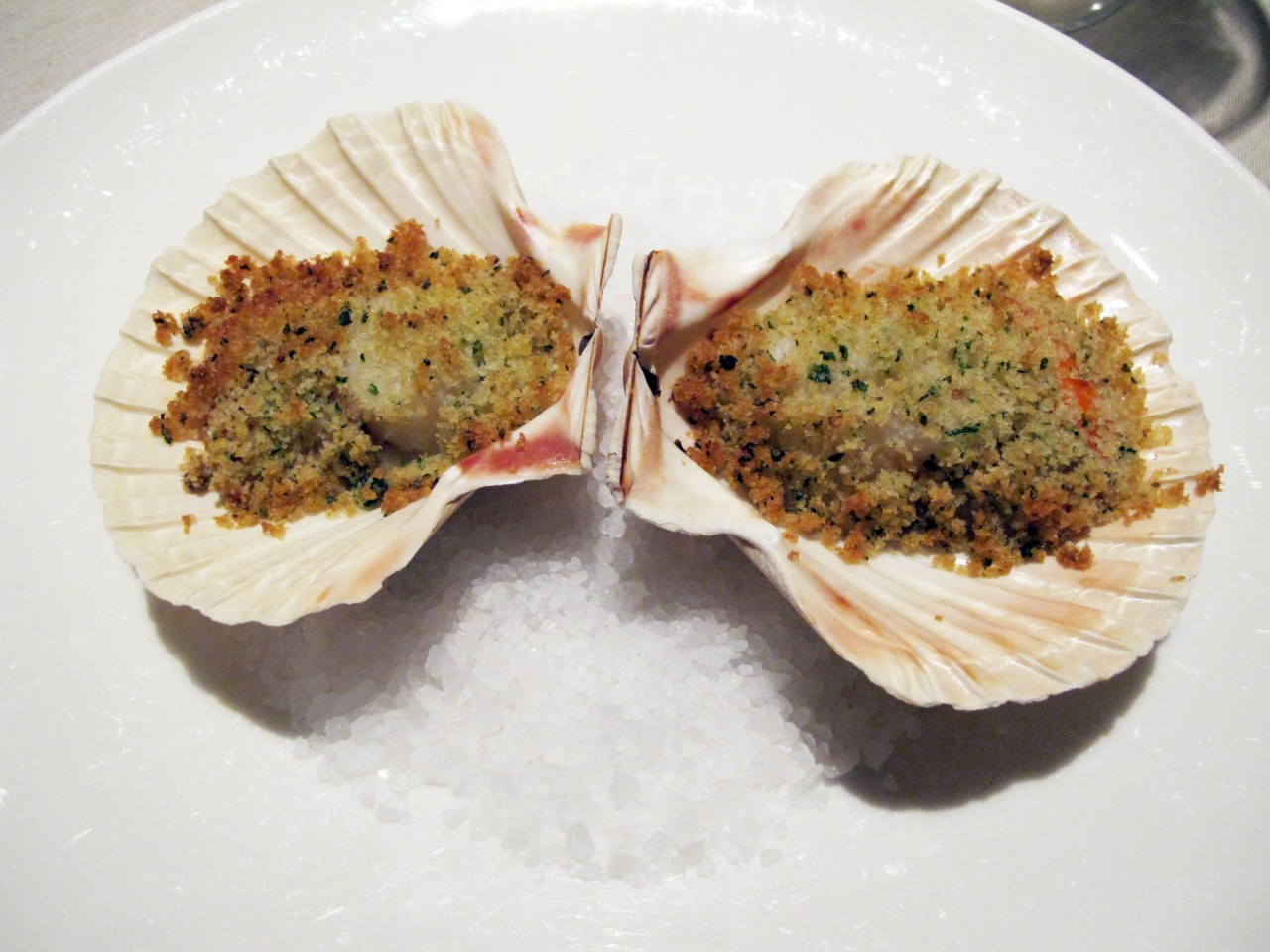 Traditional capesante gratinate, baked scallops with bread crumbs and aromatics. Credit: Copyright 2014 Cesare Zucca