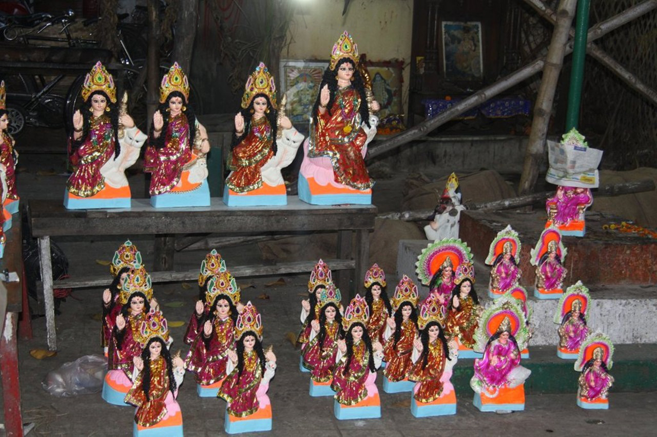 Figurines of Lakshmi, called Lokkhi in Bengali, the goddess of wealth, peace and prosperity. Credit: Copyright 2015 Rinku Bhattacharya