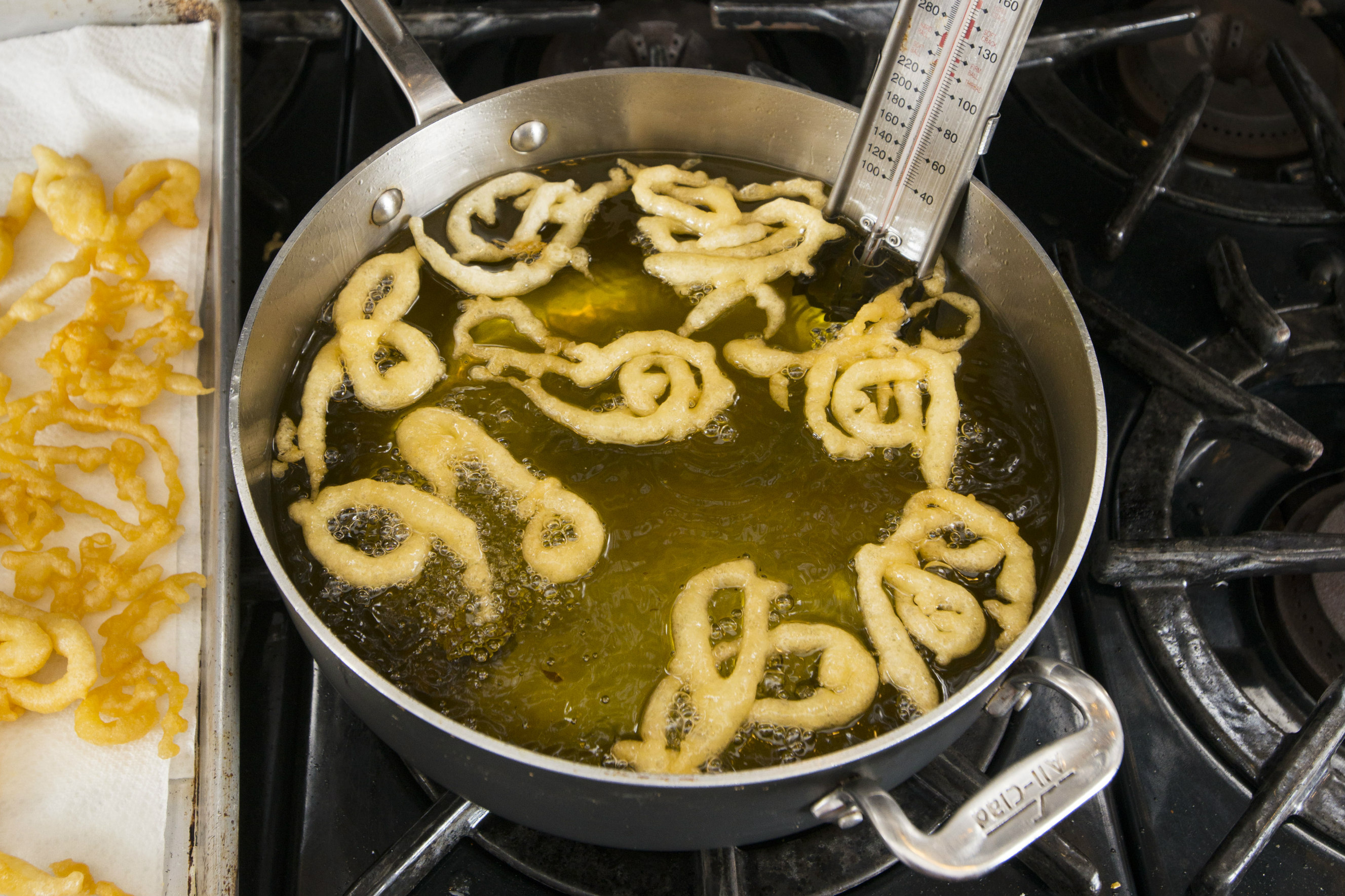 Zengoula should be fried the day they are to be eaten, although the batter must be made ahead. Credit: Copyright 2015 Staci Valentine; reprinted with permission from "The Seasonal Jewish Kitchen"