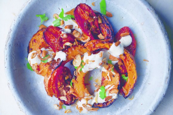 Yotam Ottolenghi's yogurt-drizzled butternut squash. Credit: Reprinted with permission from NOPI: The Cookbook by Yotam Ottolenghi and Ramael Scully, copyright 2015. Published by Ten Speed Press, an imprint of Penguin Random House LLC. Food photography: Copyright 2015 Jonathan Lovekin Location photography: Copyright 2015 Adam Hinton