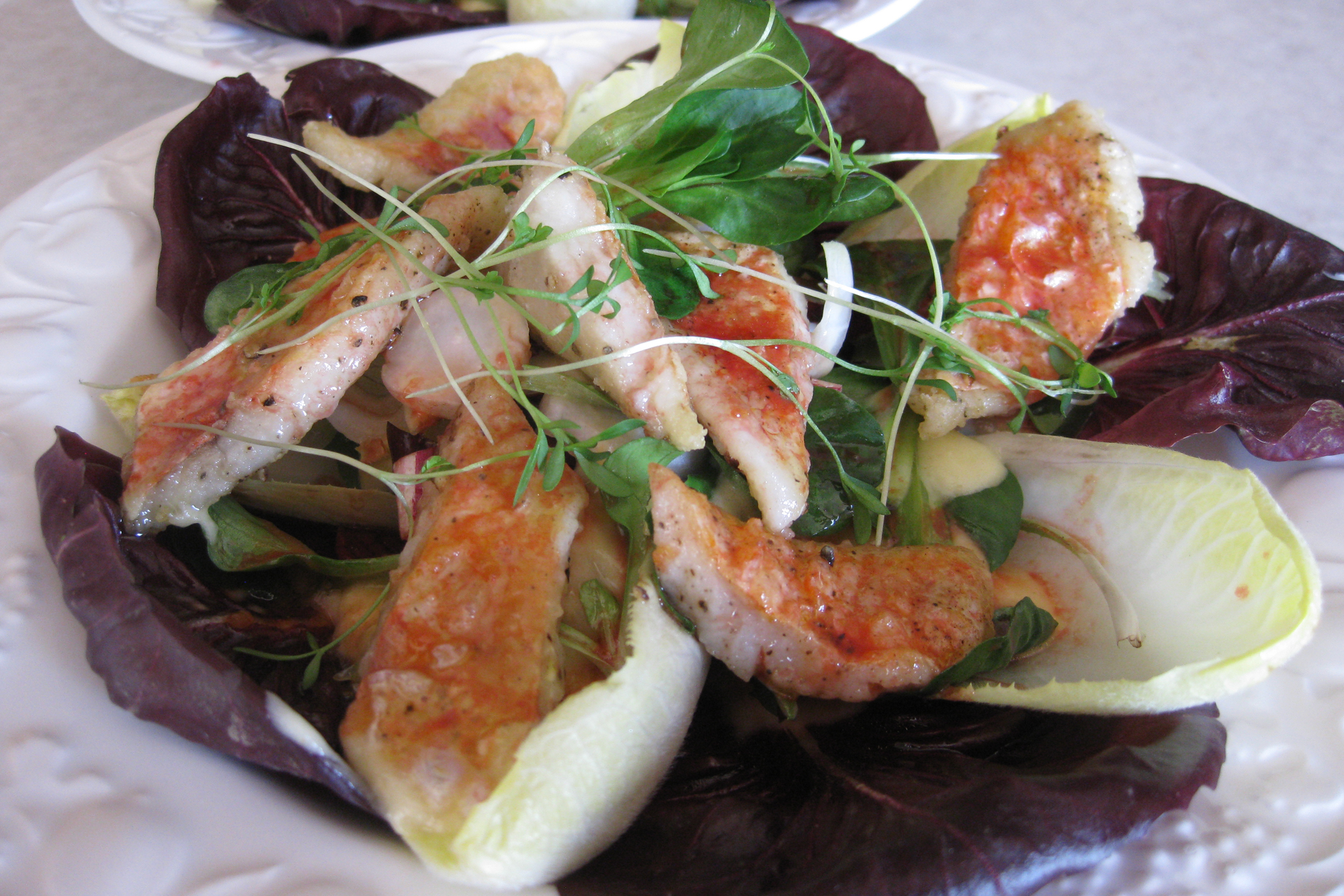 Winter warm salad of chicory and lamb’s lettuce with scallops, shrimp or red mullet. Credit: Copyright 2016 Sue Style