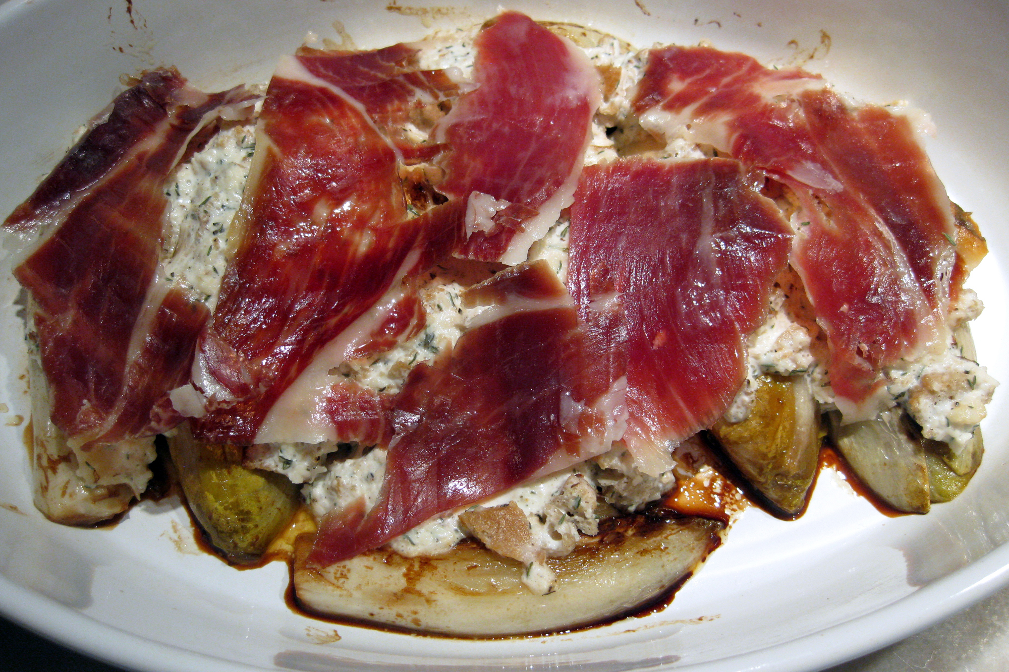 Gratin of Belgian endive with walnut and Parmesan crumble and Parma ham. Credit: Copyright 2016 Sue Style