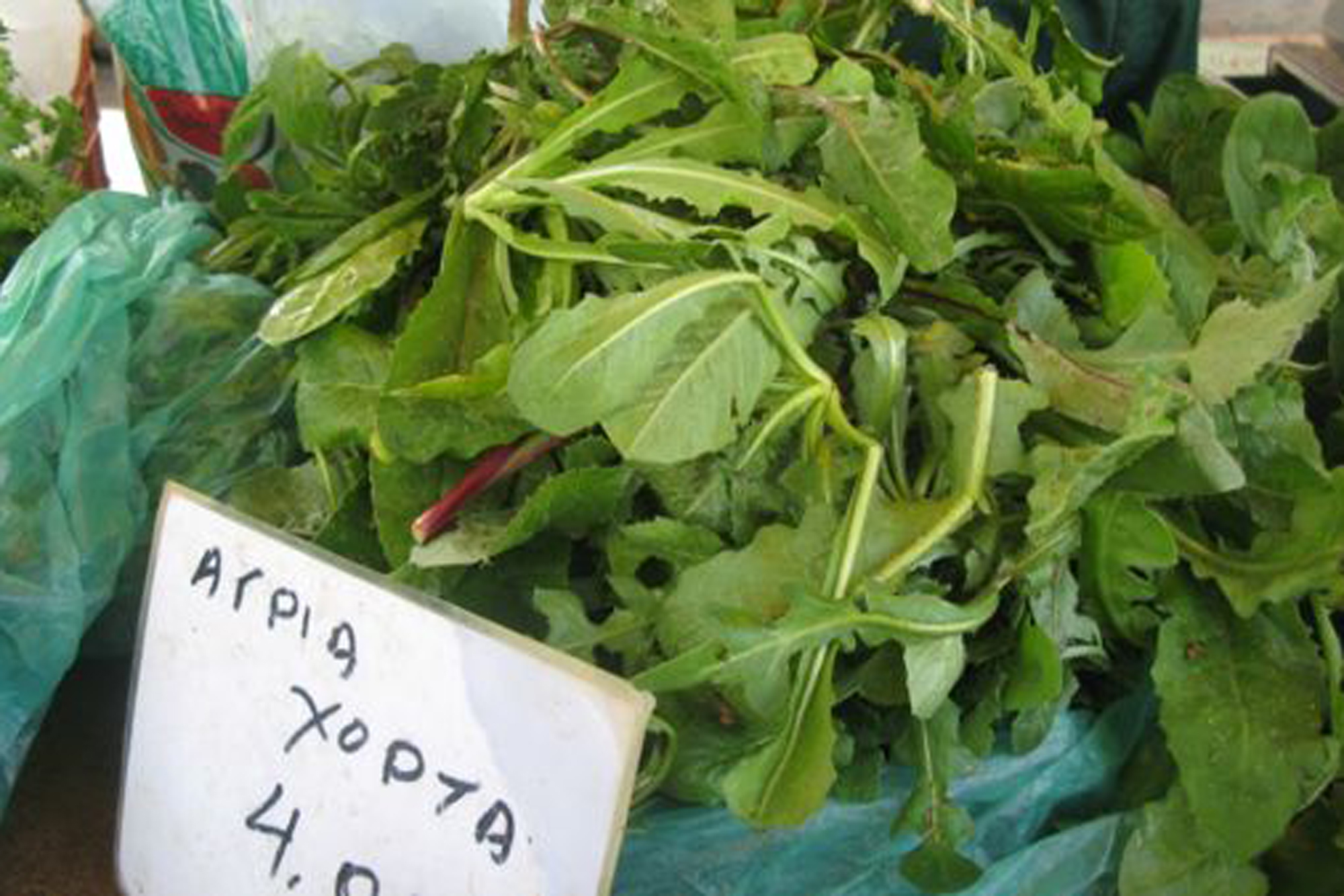 Wild greens for sale at a market in Crete. Credit: Copyright 2016 Nancy Harmon Jenkins