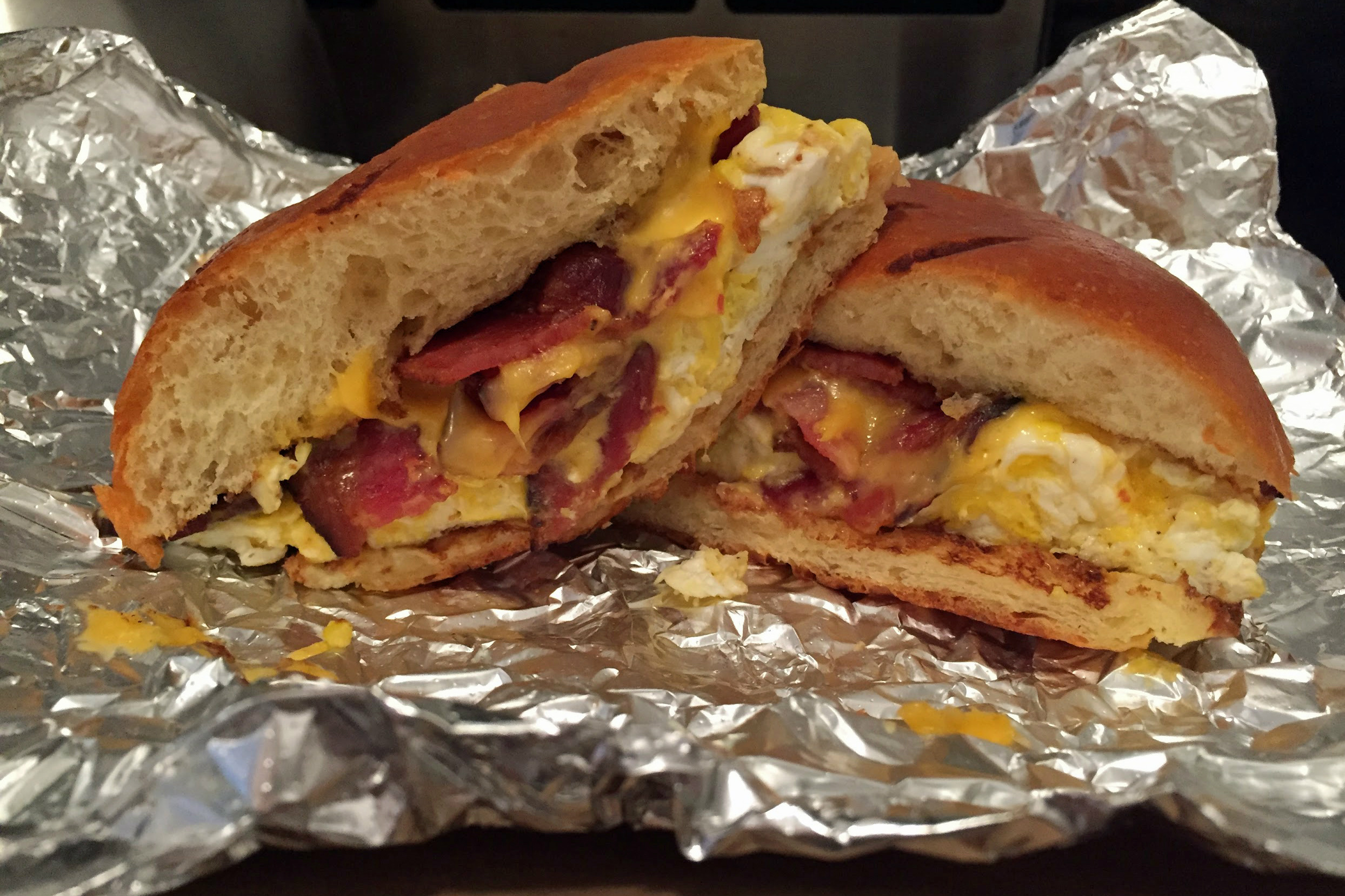 Chef Tom DeSimone of Rabbits Cafe packs extra bacon, egg and cheese into his toasted brioche bun for satisfying version that’s available all day long. Credit: Copyright 2016 Nicole Litvack