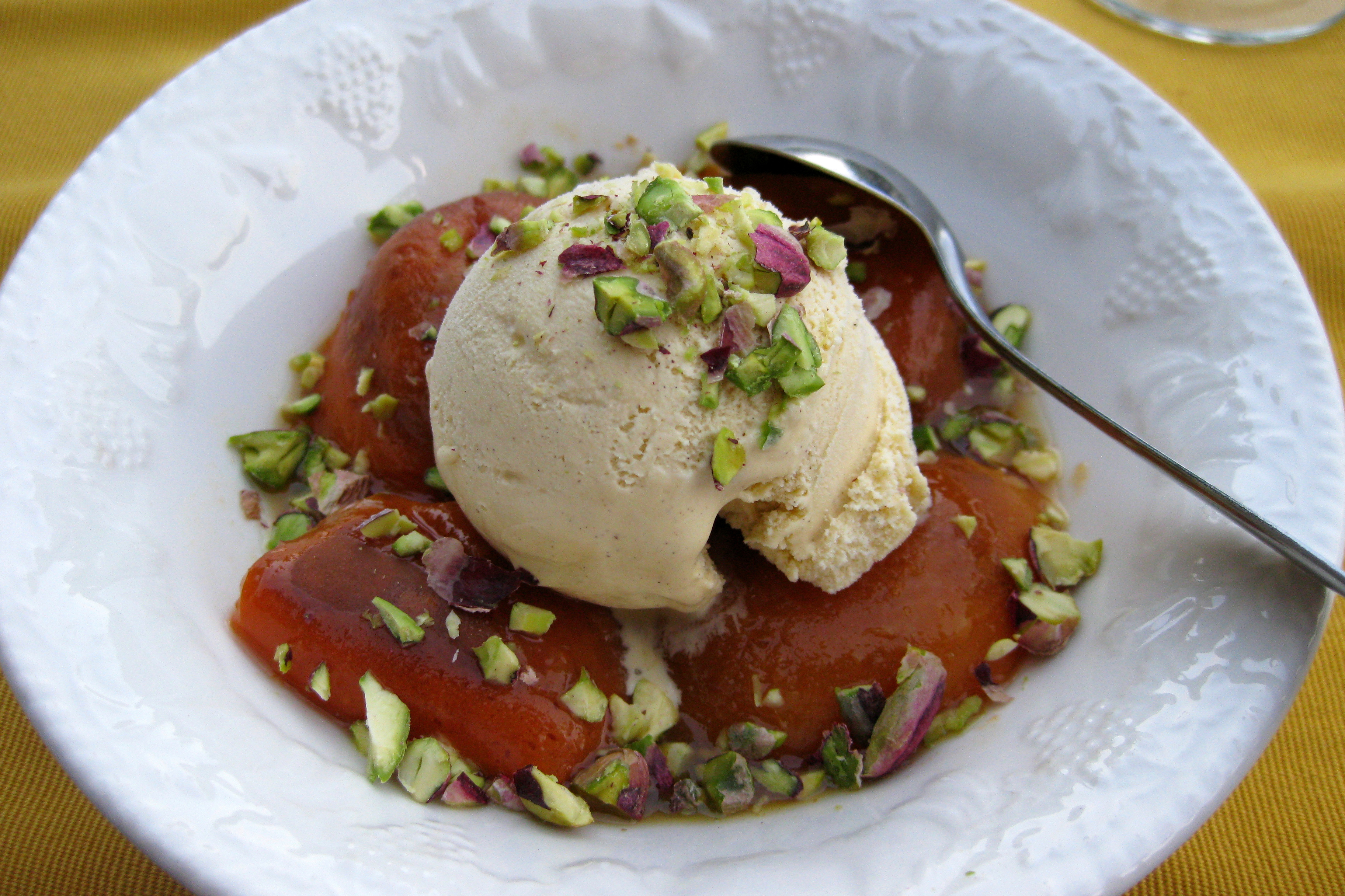 Baked Apricots with Orange Juice and Cardamom, Ice Cream and Chopped Pistachios, Credit: Copyright 2016 Sue Style