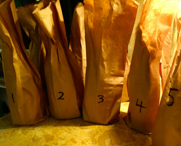 At your event, do a blind tasting. The best way to do that is to hide the label, which limits the discussion to how individual wines look, smell and taste. Credit: Copyright 2015 Zester Media